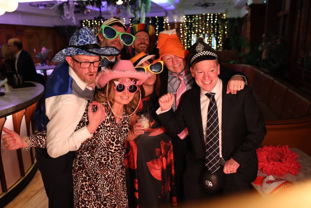Group photo at the Magic Mirror during a wedding at The Impossible York