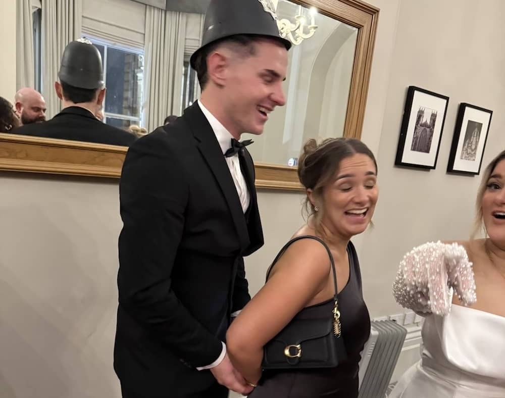 Wedding guests posing at the Magic Mirror at The Milner York