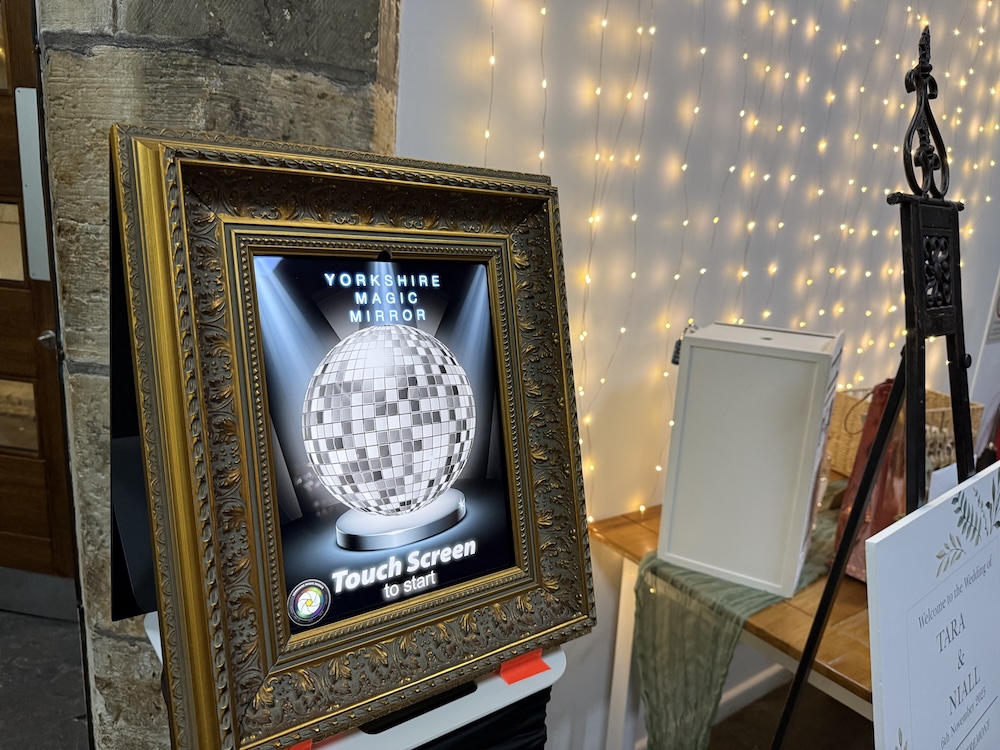 Wedding guests using the Magic Mirror at The Hospitium